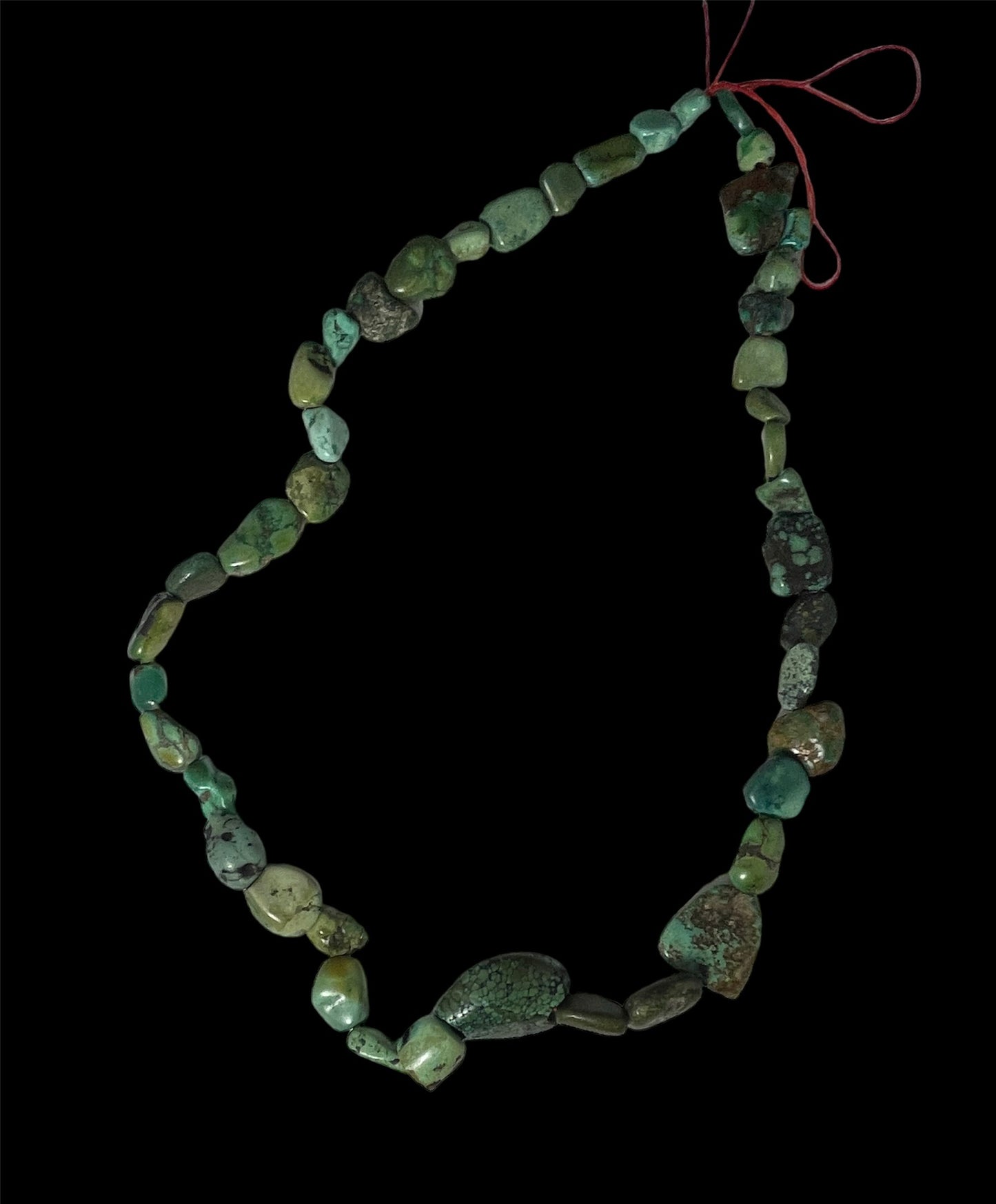 A necklace with antique Tibetan turquoise from an antique Perak