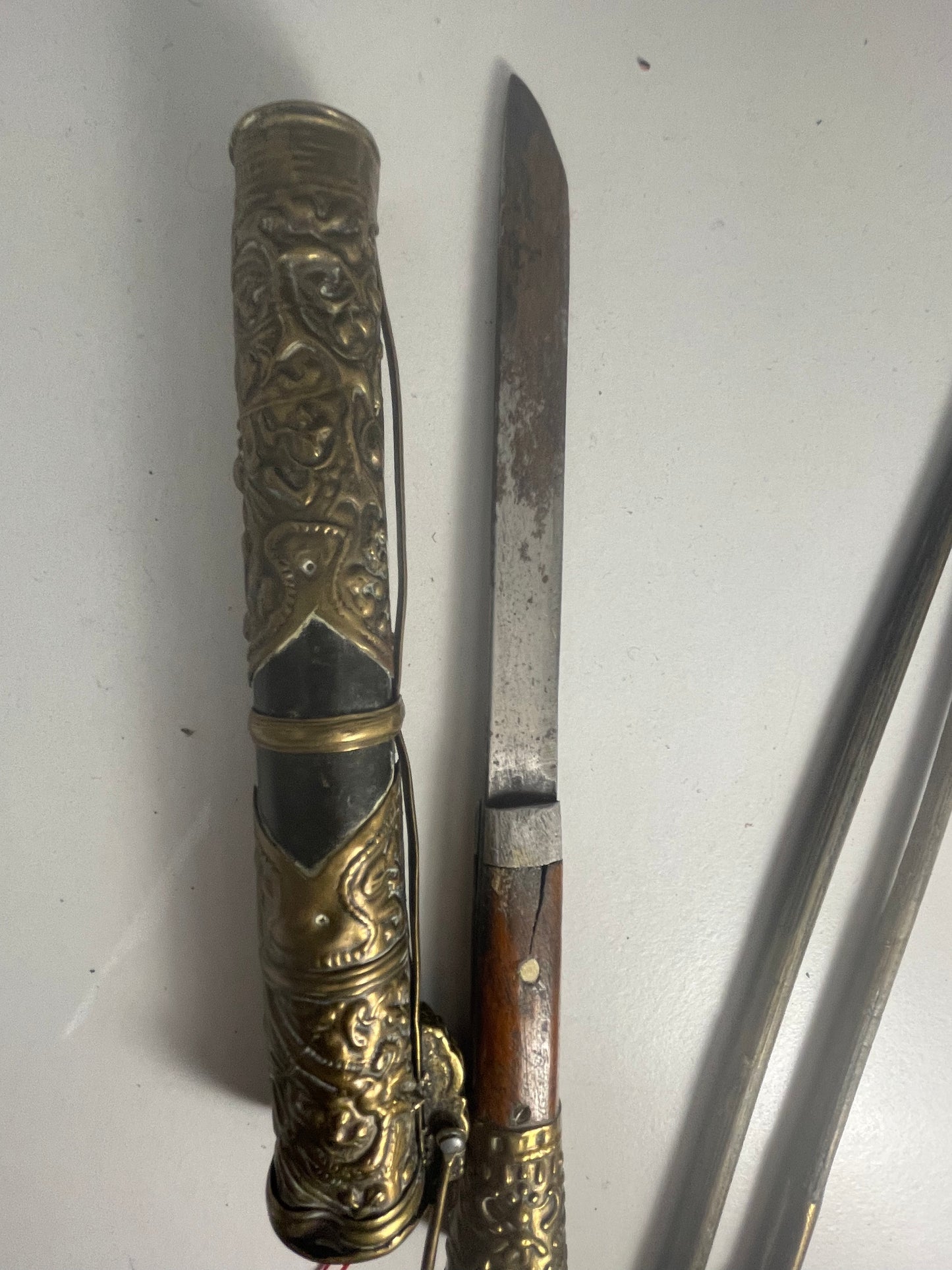 A vintage traveling dagger and chopsticks set