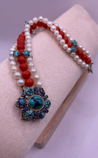 18kt gold, turquoise and sapphire, coral and pearl bracelet