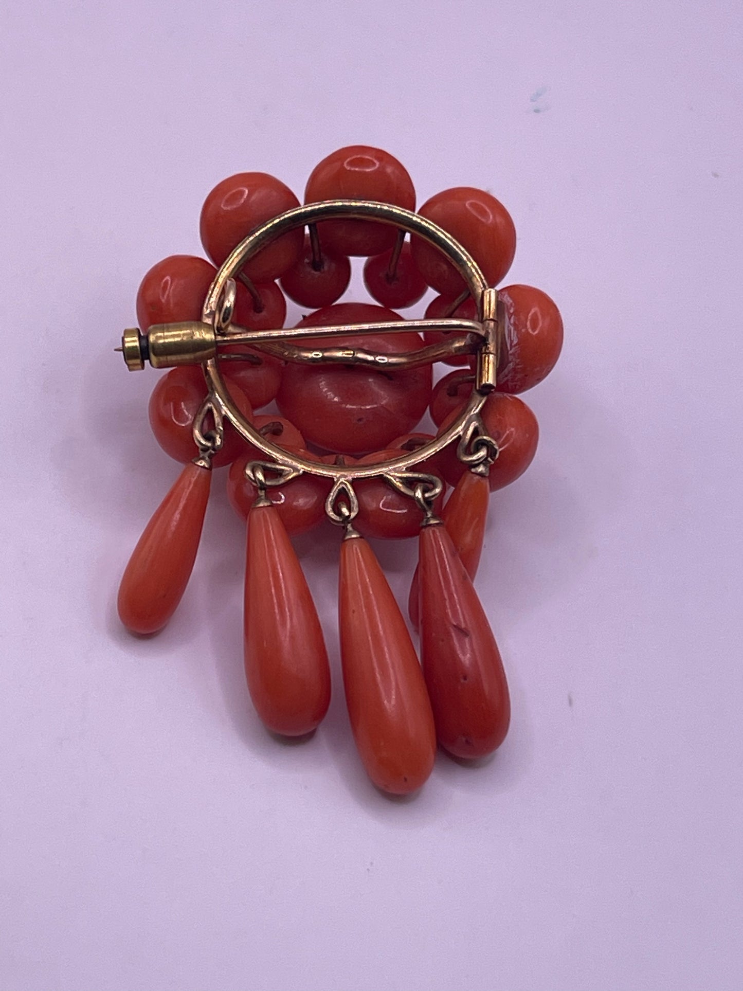 A natural untreated coral orange/ pink pin/ pendant