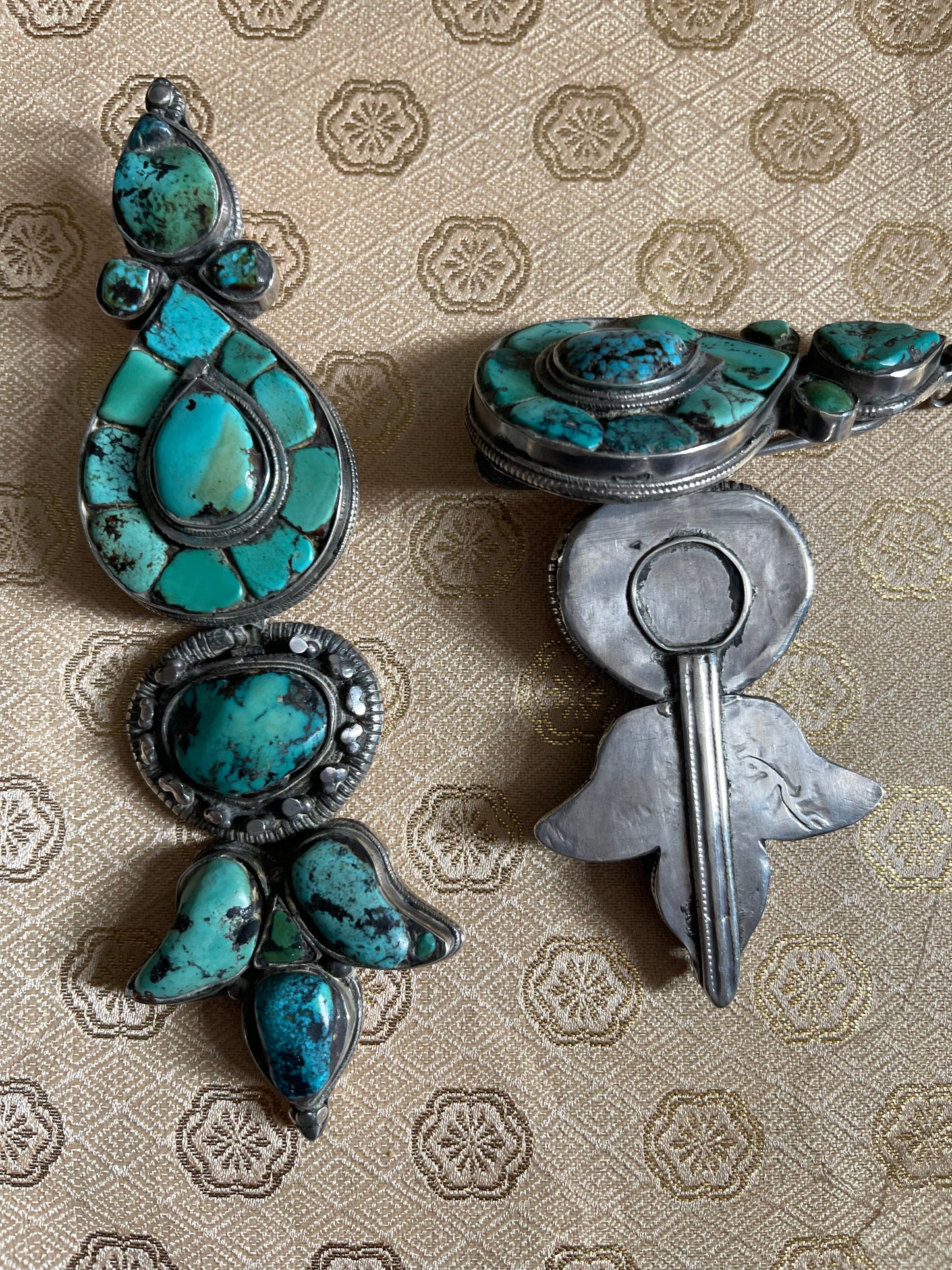 Pair of antique turquoise and silver Tibetan ear pendant / earring