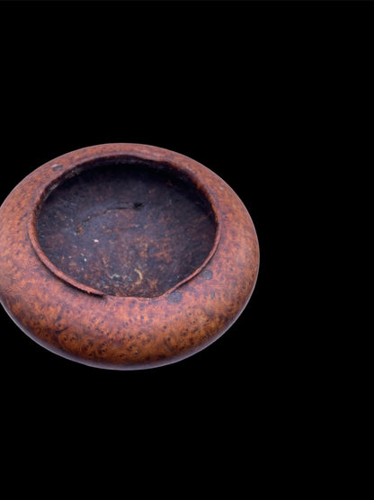 An antique burlwood tsampa container with lid