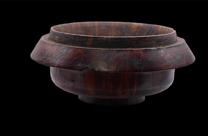 An antique burlwood tsampa container with lid