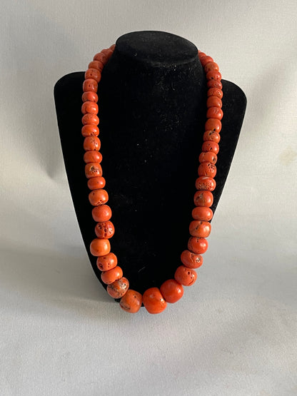 A necklace with antique coral beads