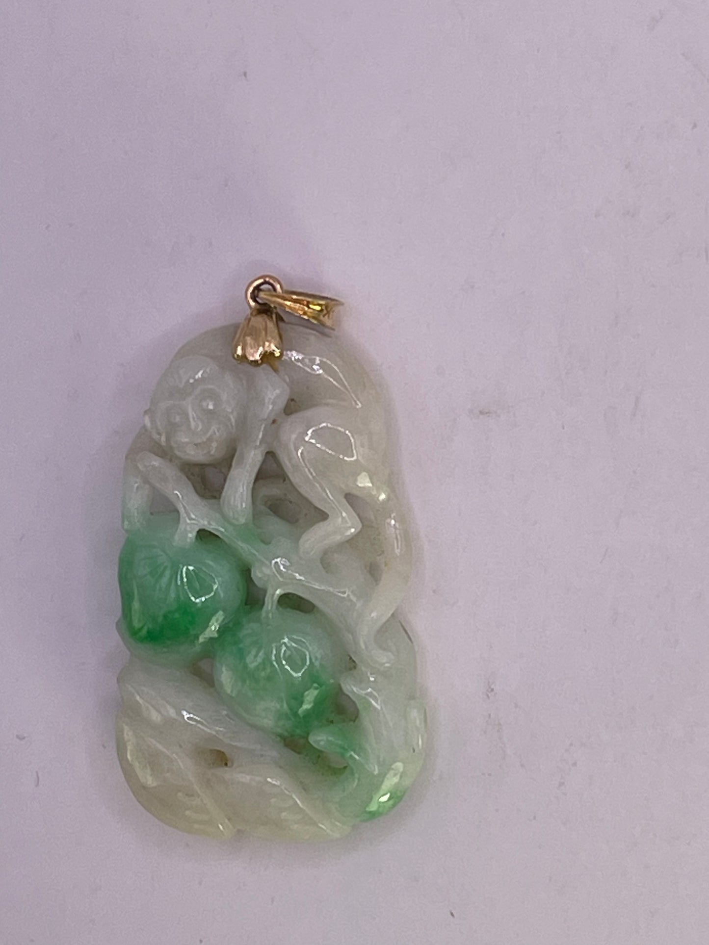 Antique jadeite carved pendant