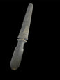 An antique Tibetan dagger with a carved silver sheath