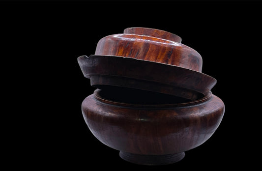 An antique burlwood tsampa container with lid