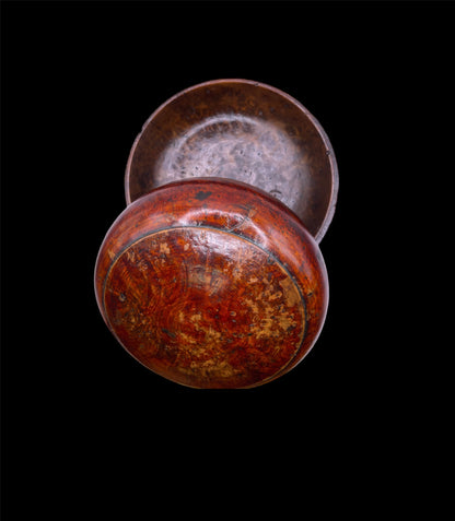 An antique burlwood tsampa bowl with cover