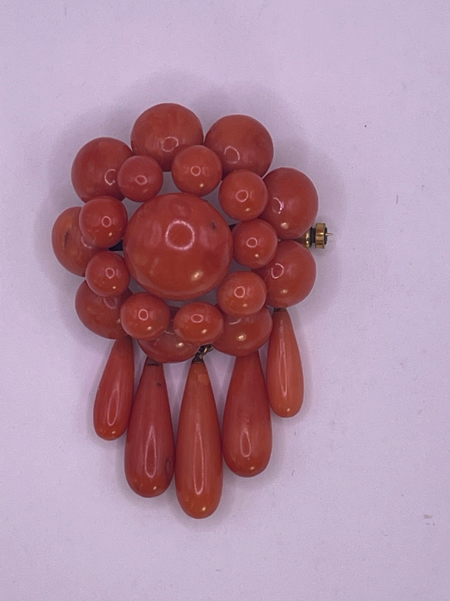 A natural untreated coral orange/ pink pin/ pendant