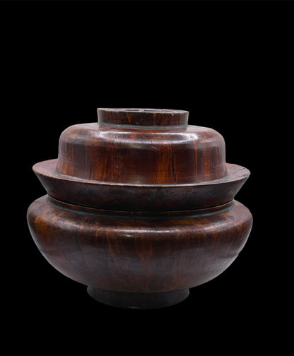 An antique burlwood tsampa container with lid