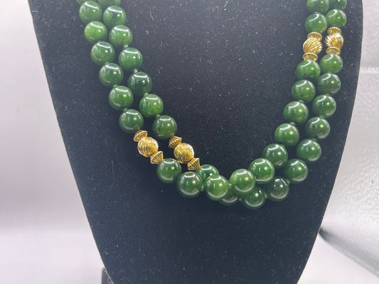 A jade nephrite and gold bead necklace