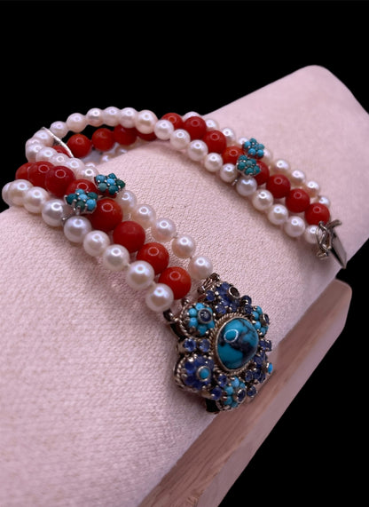 18kt gold, turquoise and sapphire, coral and pearl bracelet