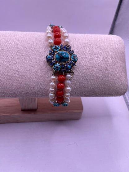 18kt gold, turquoise and sapphire, coral and pearl bracelet
