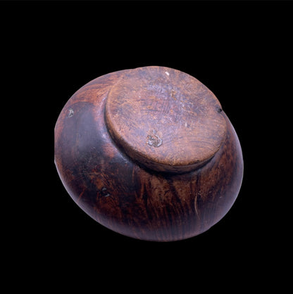 An antique burlwood tsampa container with lid