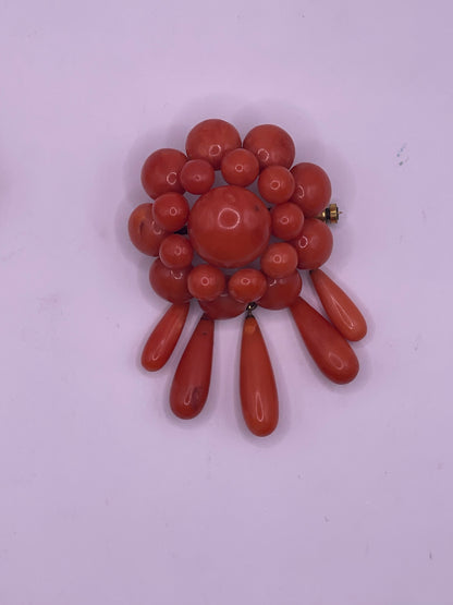 A natural untreated coral orange/ pink pin/ pendant
