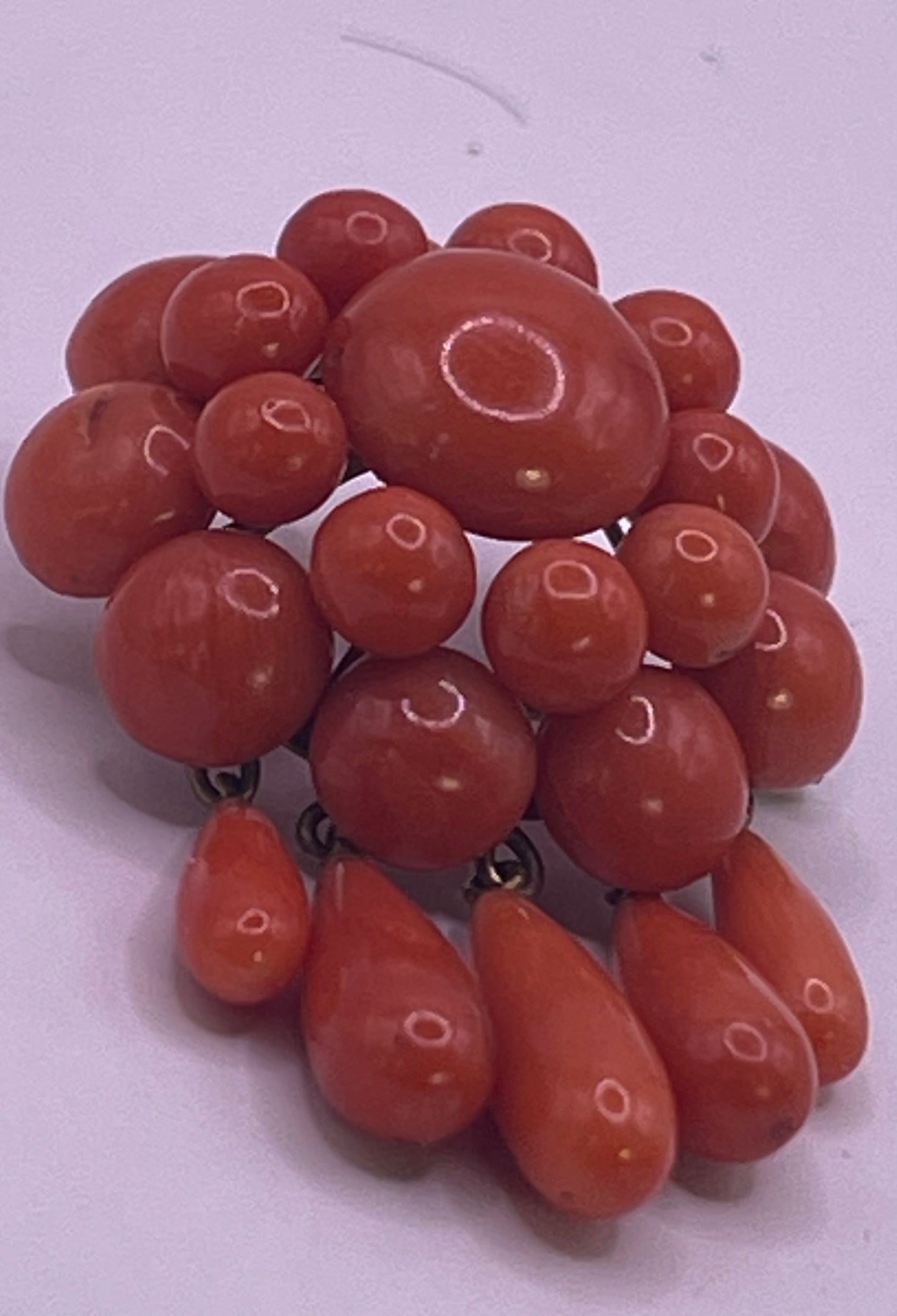 A natural untreated coral orange/ pink pin/ pendant