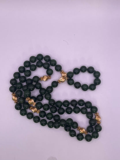 A jade nephrite and gold bead necklace