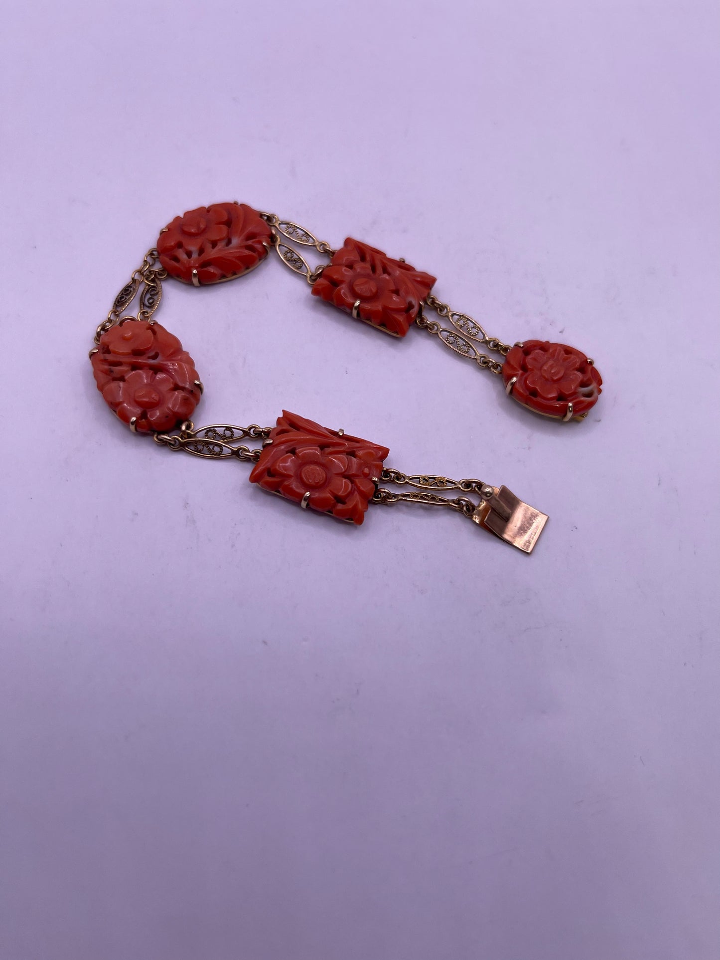 A coral plaque 14kt bracelet
