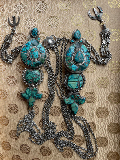 A pair of antique Tibetan earrings -aykhor