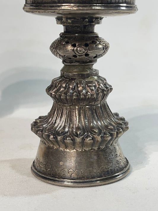 A pair of Tibetan silver butter lamps