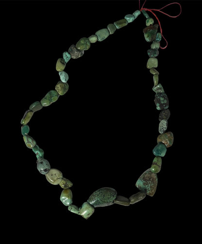 A necklace with antique Tibetan turquoise from an antique Perak