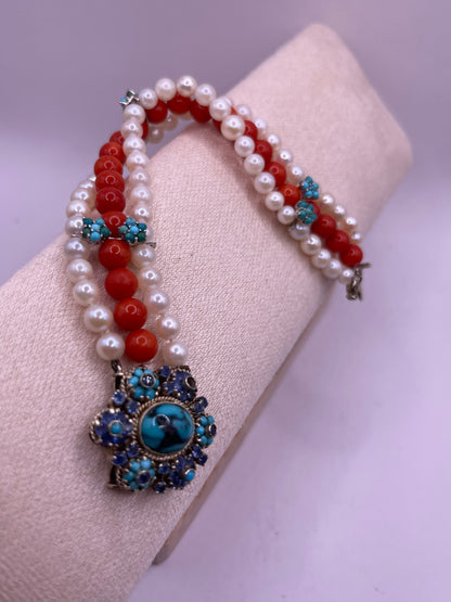 18kt gold, turquoise and sapphire, coral and pearl bracelet