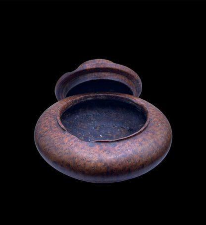 An antique burlwood tsampa container with lid