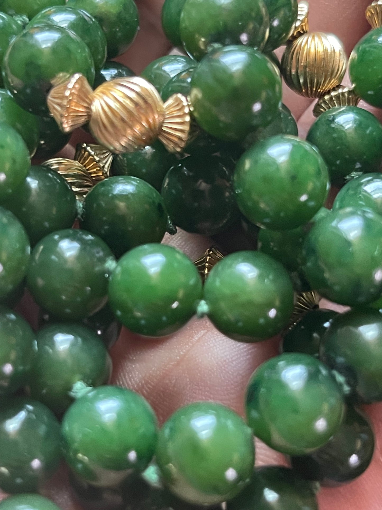 A jade nephrite and gold bead necklace