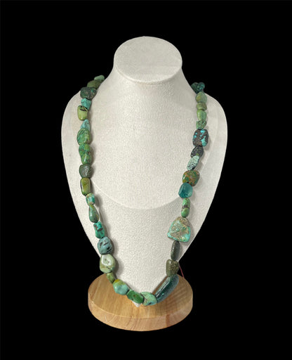 A necklace with antique Tibetan turquoise from an antique Perak
