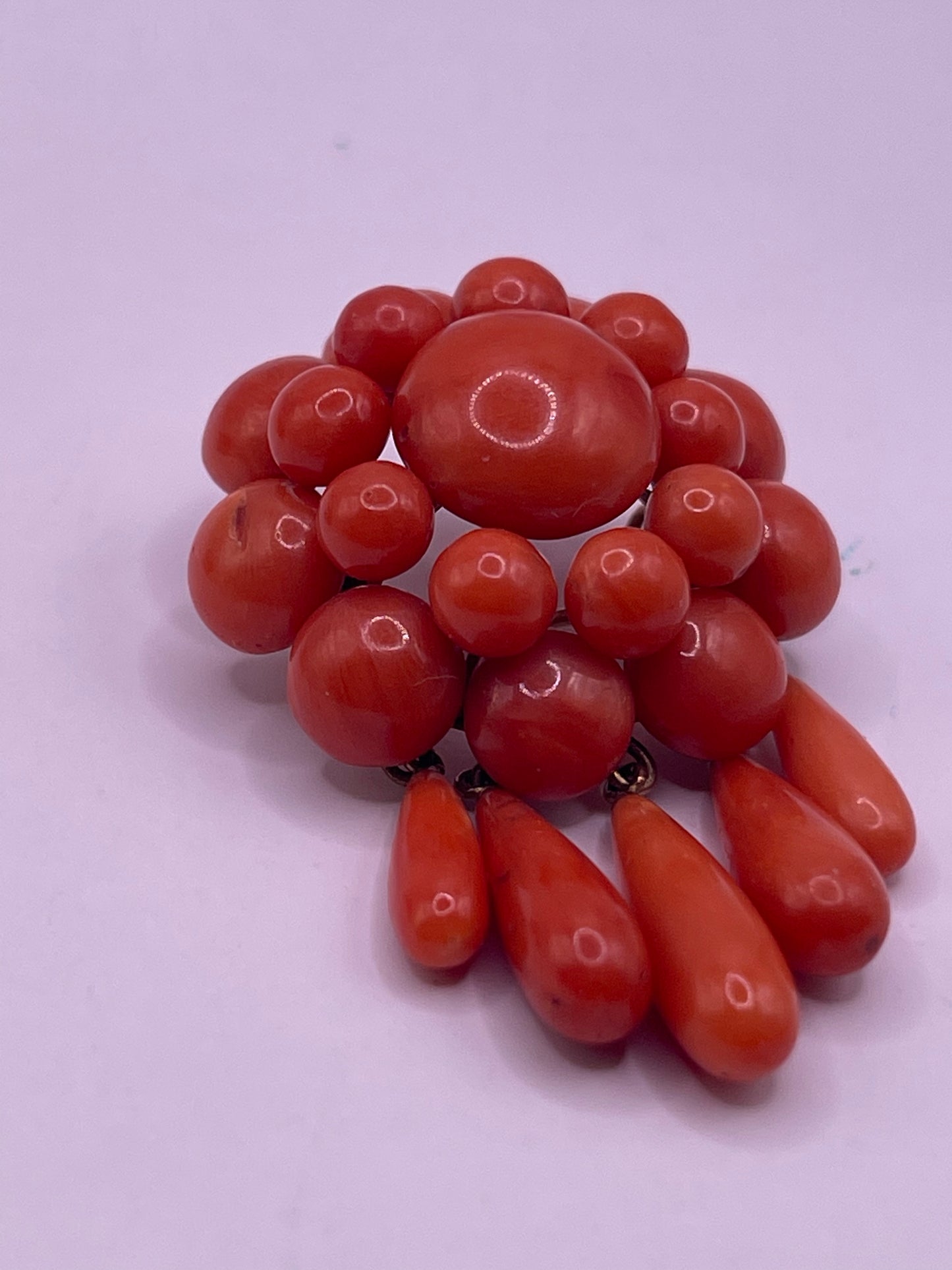 A natural untreated coral orange/ pink pin/ pendant