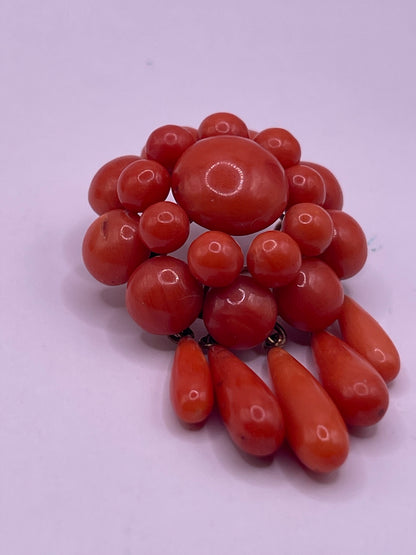 A natural untreated coral orange/ pink pin/ pendant