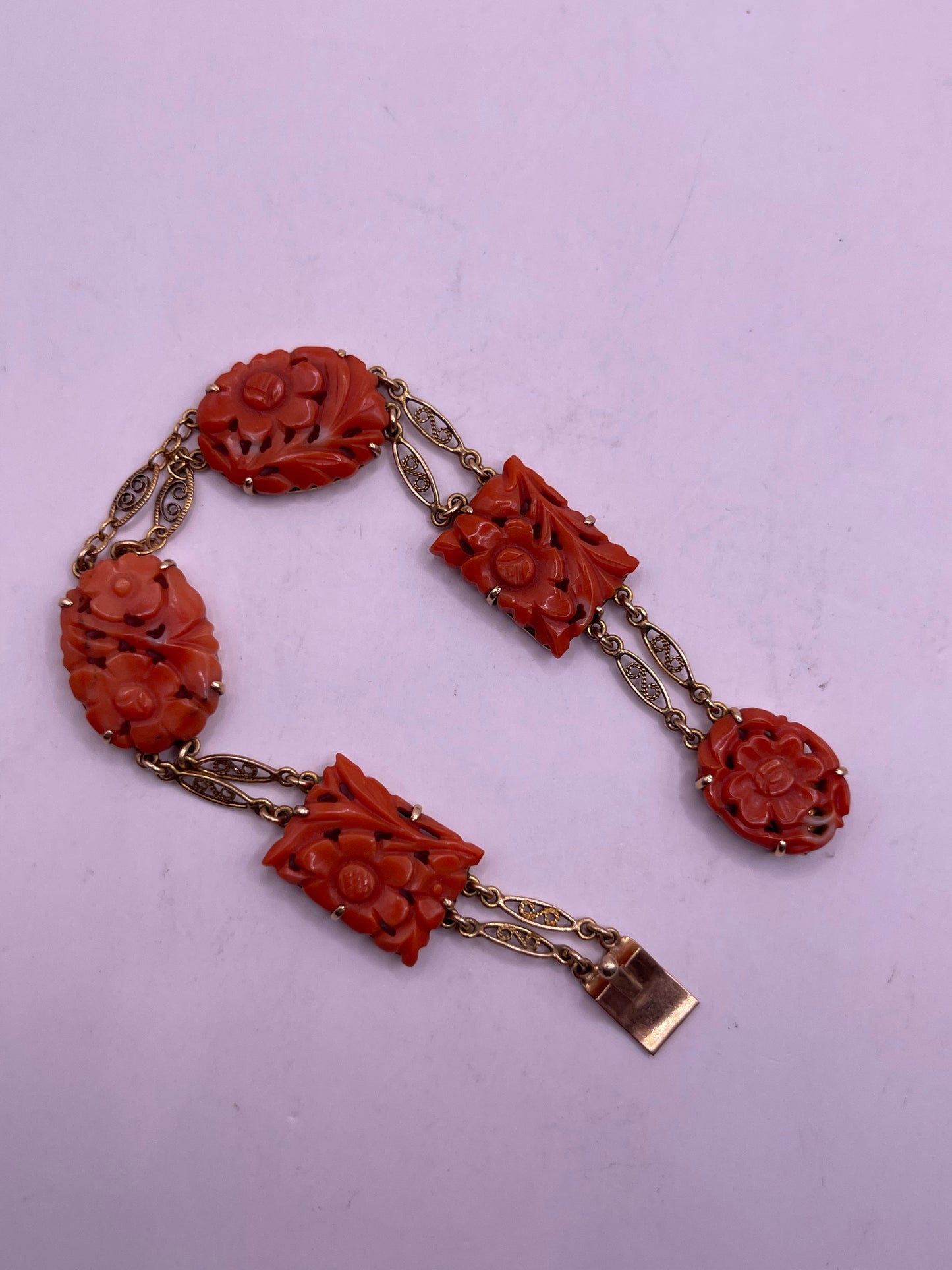 A coral plaque 14kt bracelet