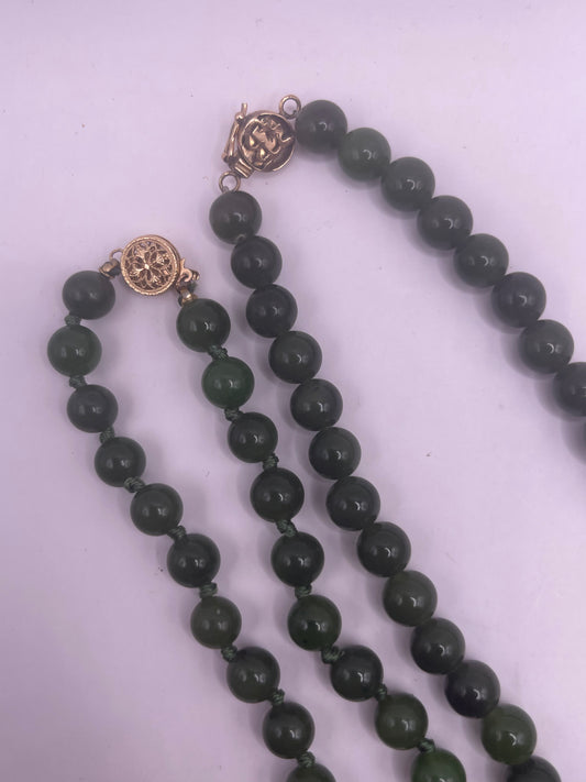 A jade necklace and turquoise beads