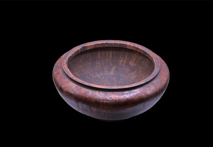 An antique burlwood tsampa container with lid