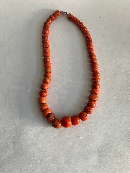 A necklace with antique coral beads