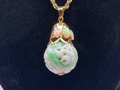 Carved shou jade bead pendant with opals and ruby