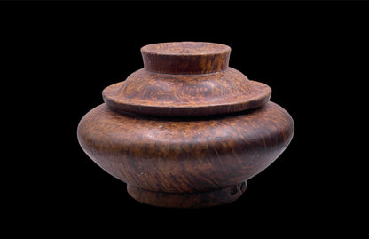 An antique burlwood tsampa container with lid