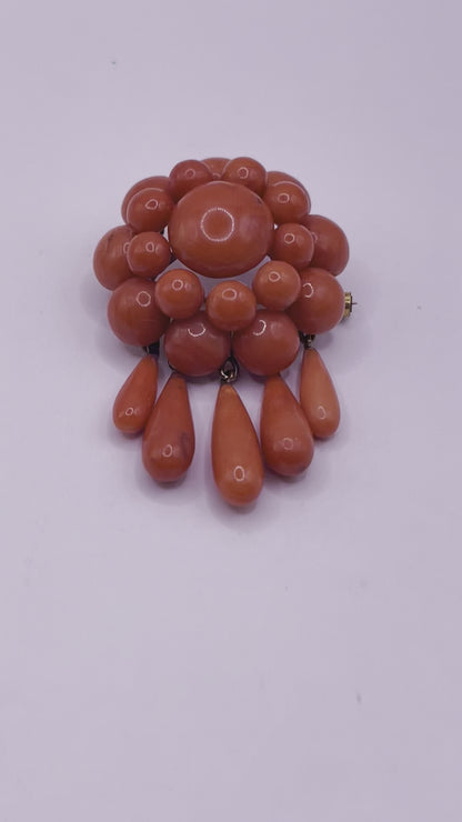 A natural untreated coral orange/ pink pin/ pendant