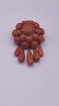 A natural untreated coral orange/ pink pin/ pendant