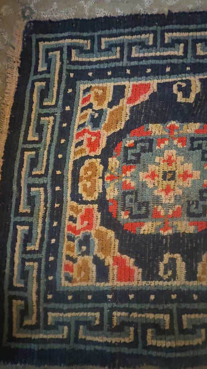 Antique 19th Century navy blue Tibetan woolen rug