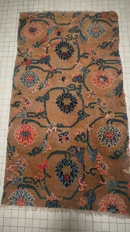 An antique  Tibetan  rug