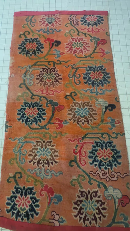 An early 20th C., antique Tibetan floral  cushion rug