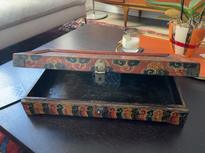An antique rectangular flat Tibetan wood box