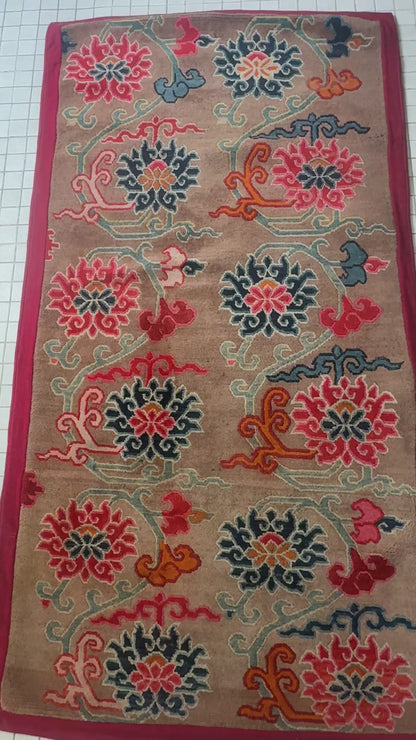 An early to mid 20th C., antique Tibetan floral  cushion rug