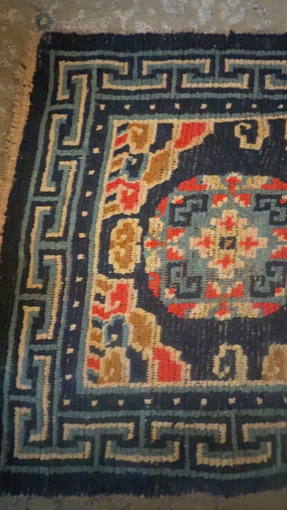 Antique 19th Century navy blue Tibetan woolen rug