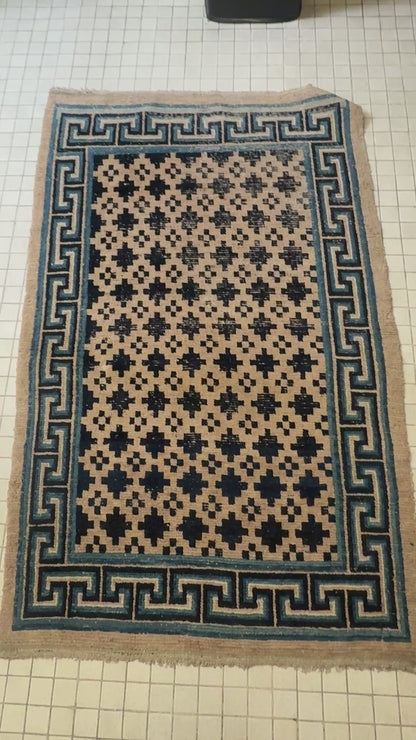 Antique Tibetan wool geometrical vegetable dyed rug