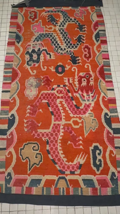 A 19th C., unique antique Tibetan dragon rug