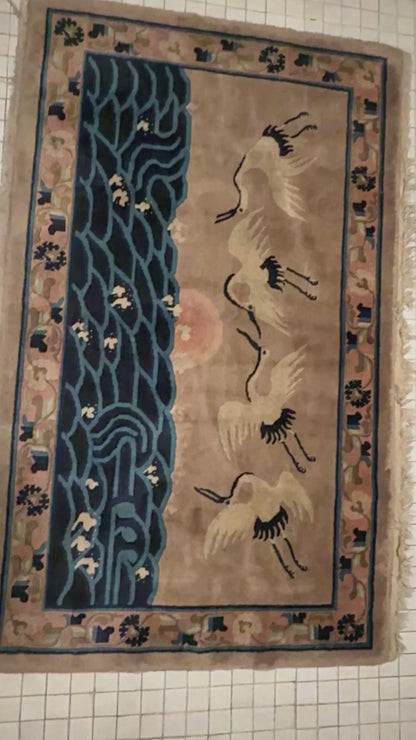 An antique Chinese pictorial rug