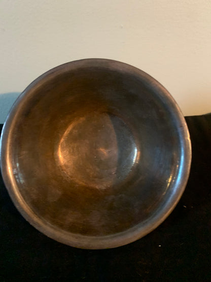 A jade bowl with silver details