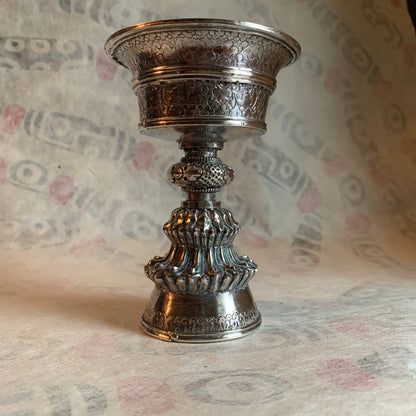 A silver Tibetan butterlamp